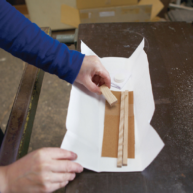 The exterior packaging 
		is made by hand in-house.