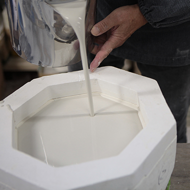 The complex and detailed design structure is created through casting.